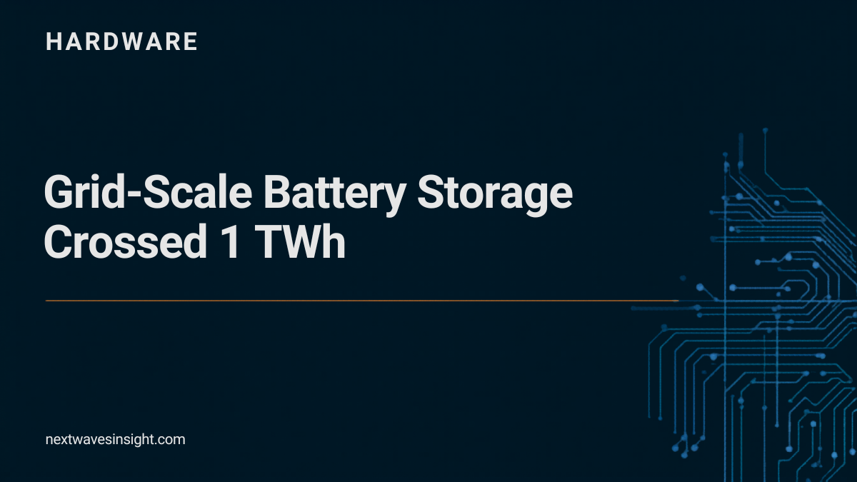 Dark navy editorial card with the headline 'Grid-Scale Battery Storage Crossed 1 TWh' and a teal circuit-board pattern - NextWave Insight Hardware pillar